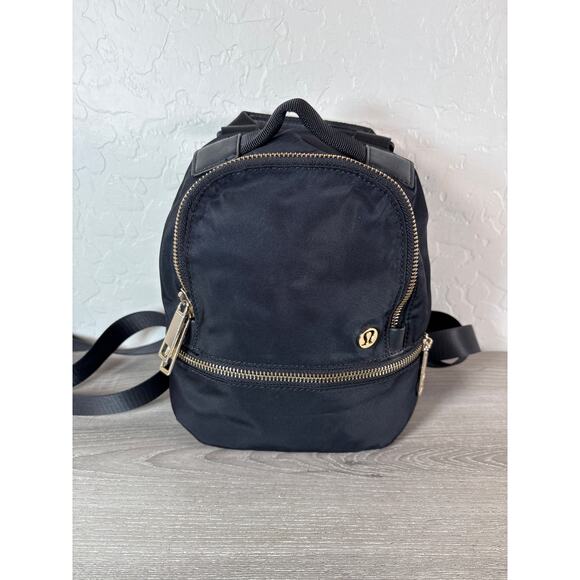 Lululemon micro-sized City Adventurer Backpack Convertible Crossbody Bag Black - Picture 1 of 7